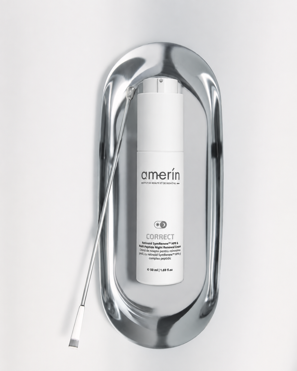 A white Amerín CORRECT_Night Cream with HPR retinoidand Peptides SYN-TC bottle displayed inside a polished silver metallic frame on a light gray background.