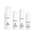 Four white Amerín skincare bottles and pump containers arranged in a row on a white background, including Essential, Defend, and Correct lines.